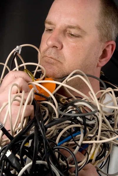 Man Tangled in Wires — depositphotos.com